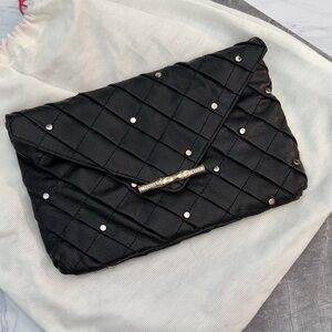 Elaine Turner leather clutch